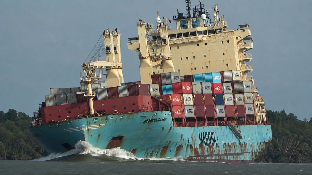 Massive Maersk Container Ship Heels Hard in a Narrow River