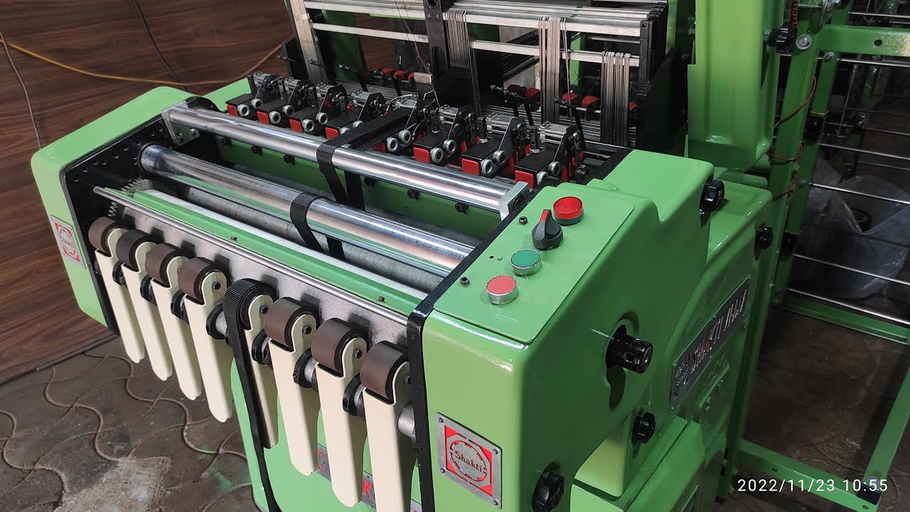 NARROW FABRIC NEEDLE LOOM MACHINE MODEL FOR PP TAPE BEST QUALITY AND DOUBLE PRODUCTION  .
