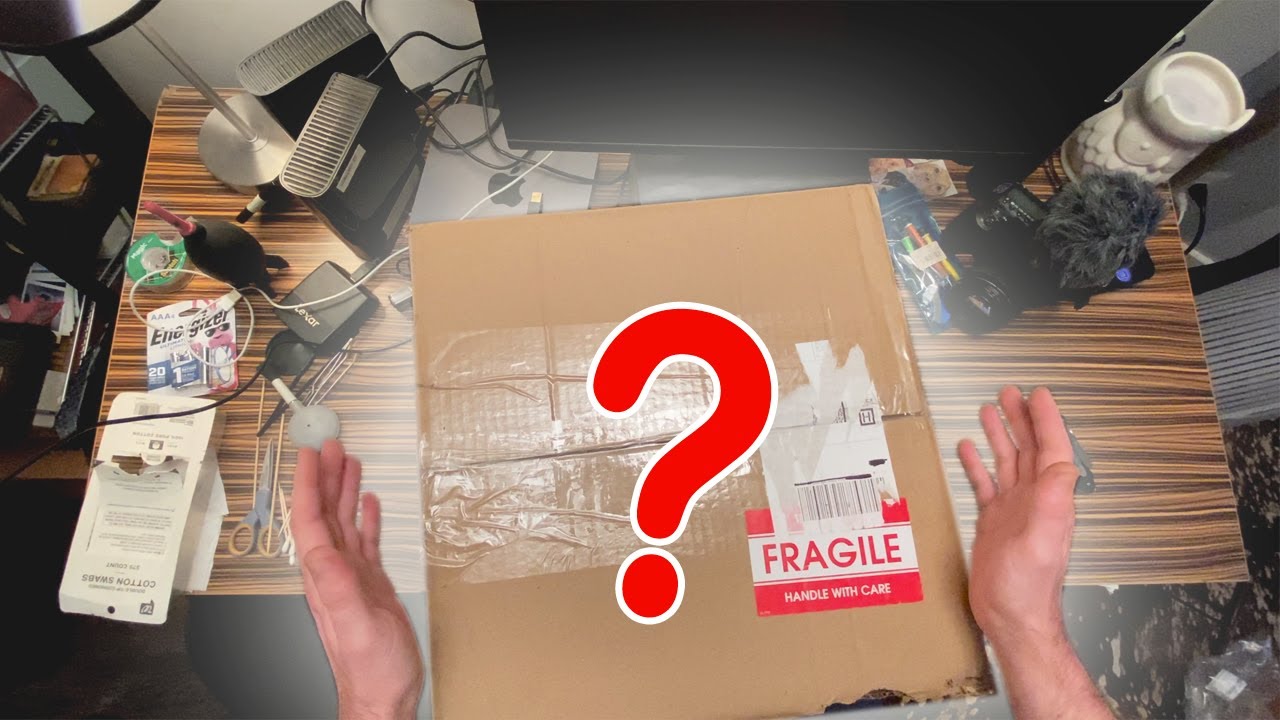 Unboxing a mystery lot of old cameras. Will there be a Leica?