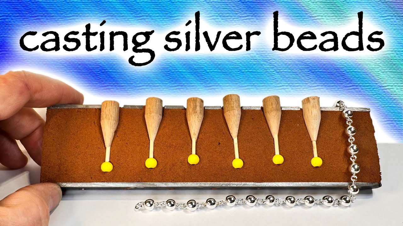 Delft clay sand casting silver beads for jewellery making.