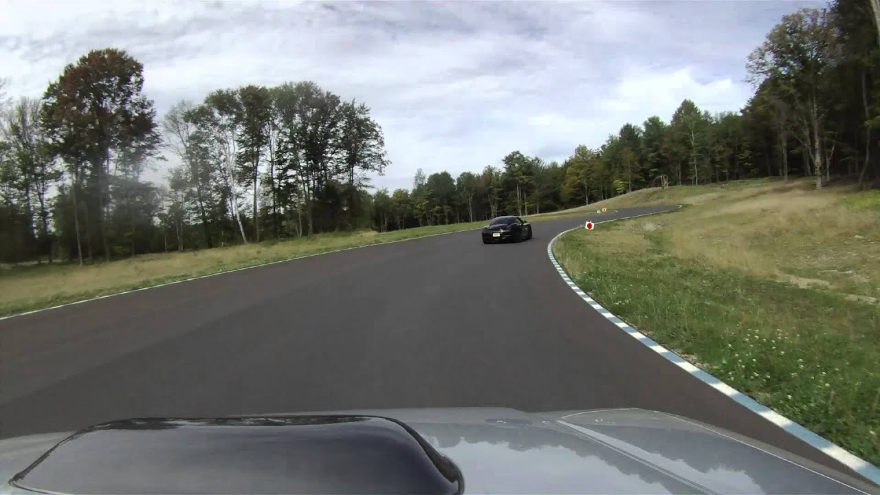 Subaru Forester STi vs. Porsche Cayman S track battle NYST 9.15.13