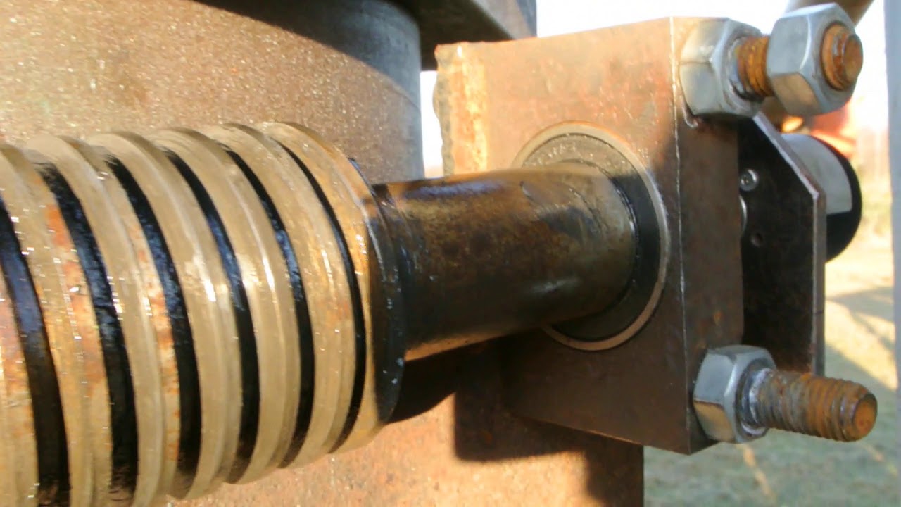 solar tracker DIY - truck hub and tractor flywheel for azimuth turn