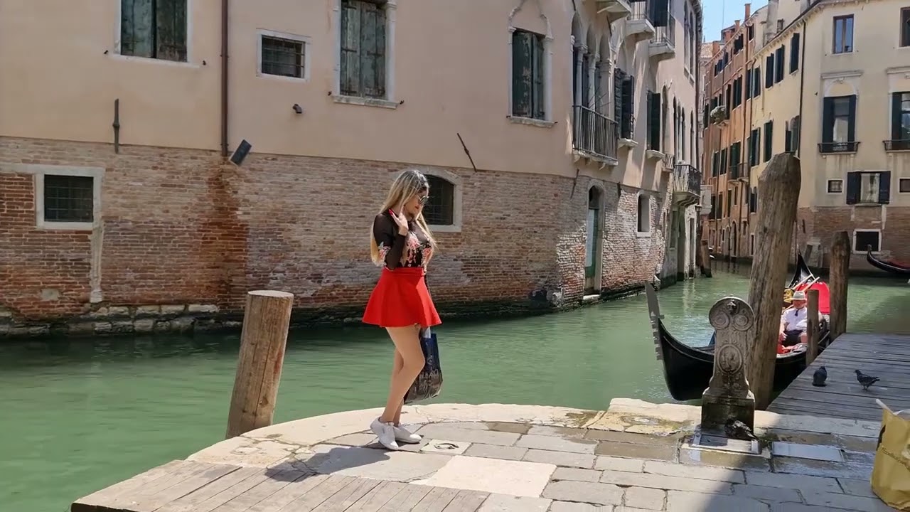 Granate Styling, walking public, sightseeing near small channels Venice, Italy, miniskirt, stockings