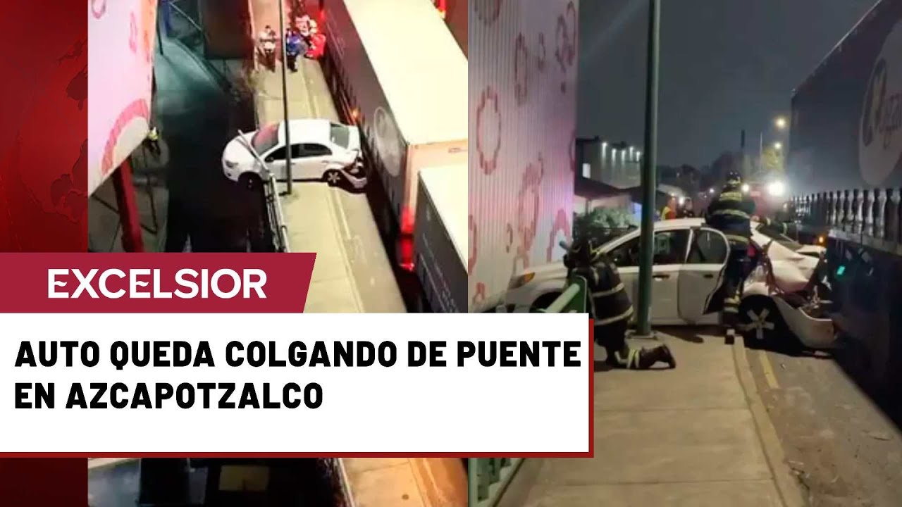 Auto queda colgando de puente luego de chocar contra tráiler