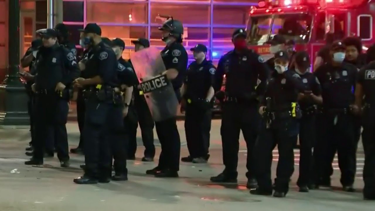 Group of protesters confront Detroit police