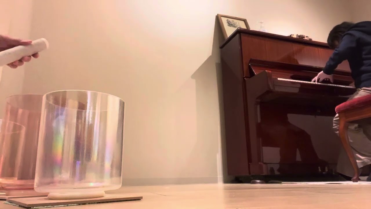 Piano playing with Crystal Bowls 