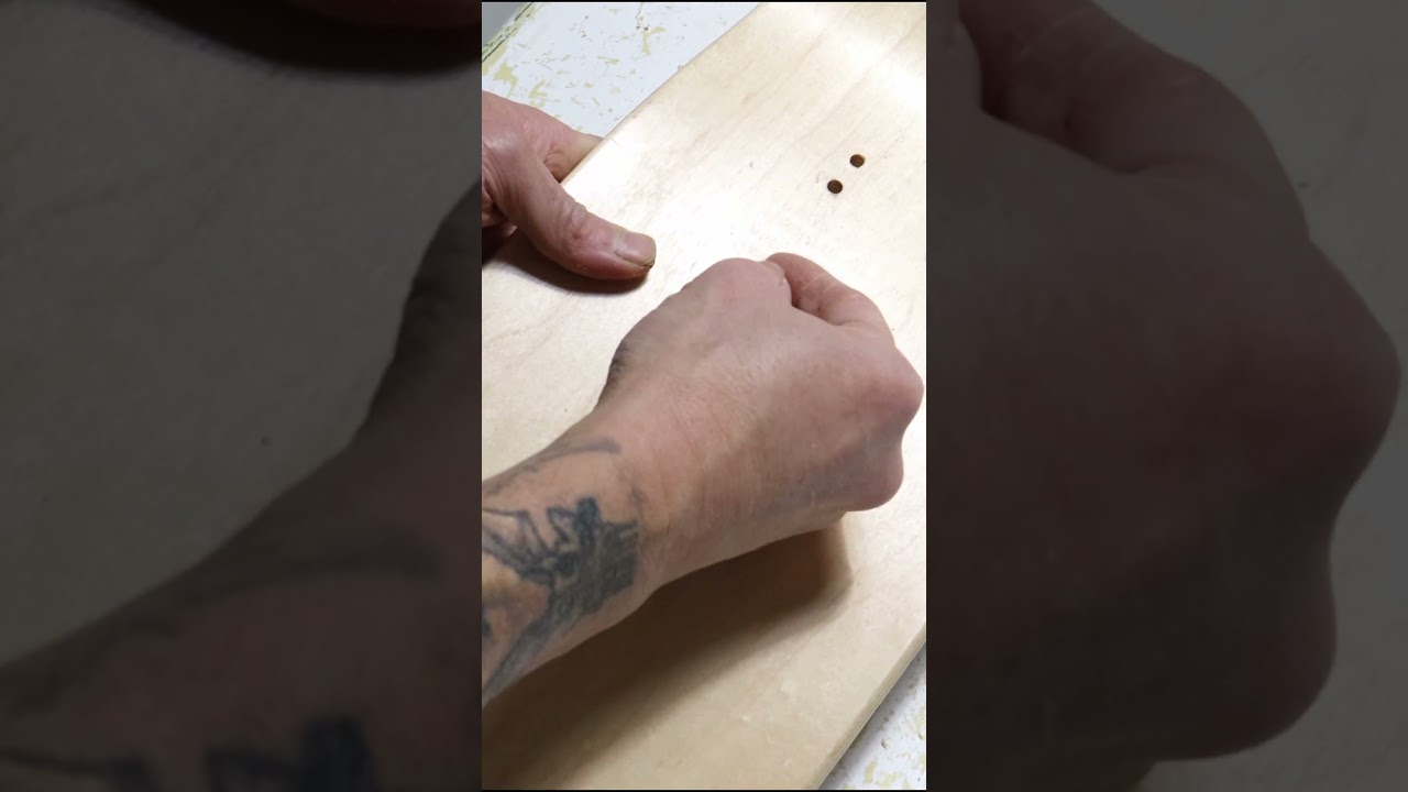 Custom wheelbase redrill on a Witter freestyle skateboard deck