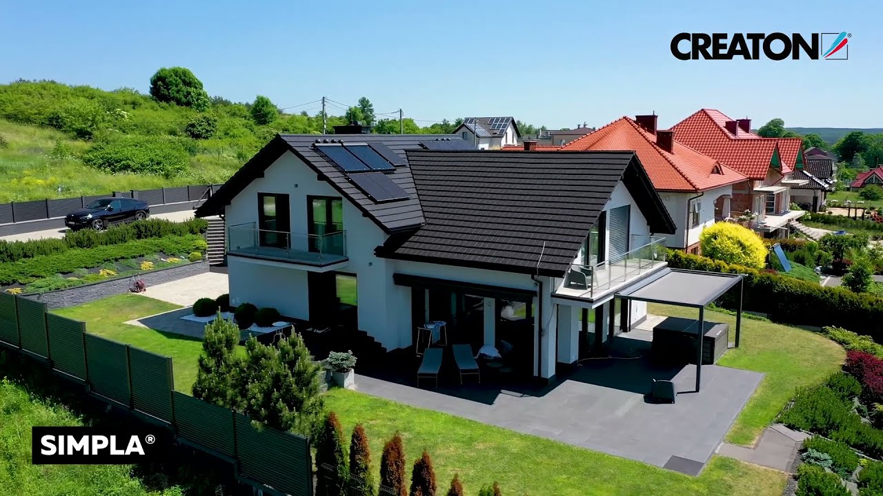 🏠 Realizacja - Płaska dachówka ceramiczna swissporTON SIMPLA antracytowa angoba