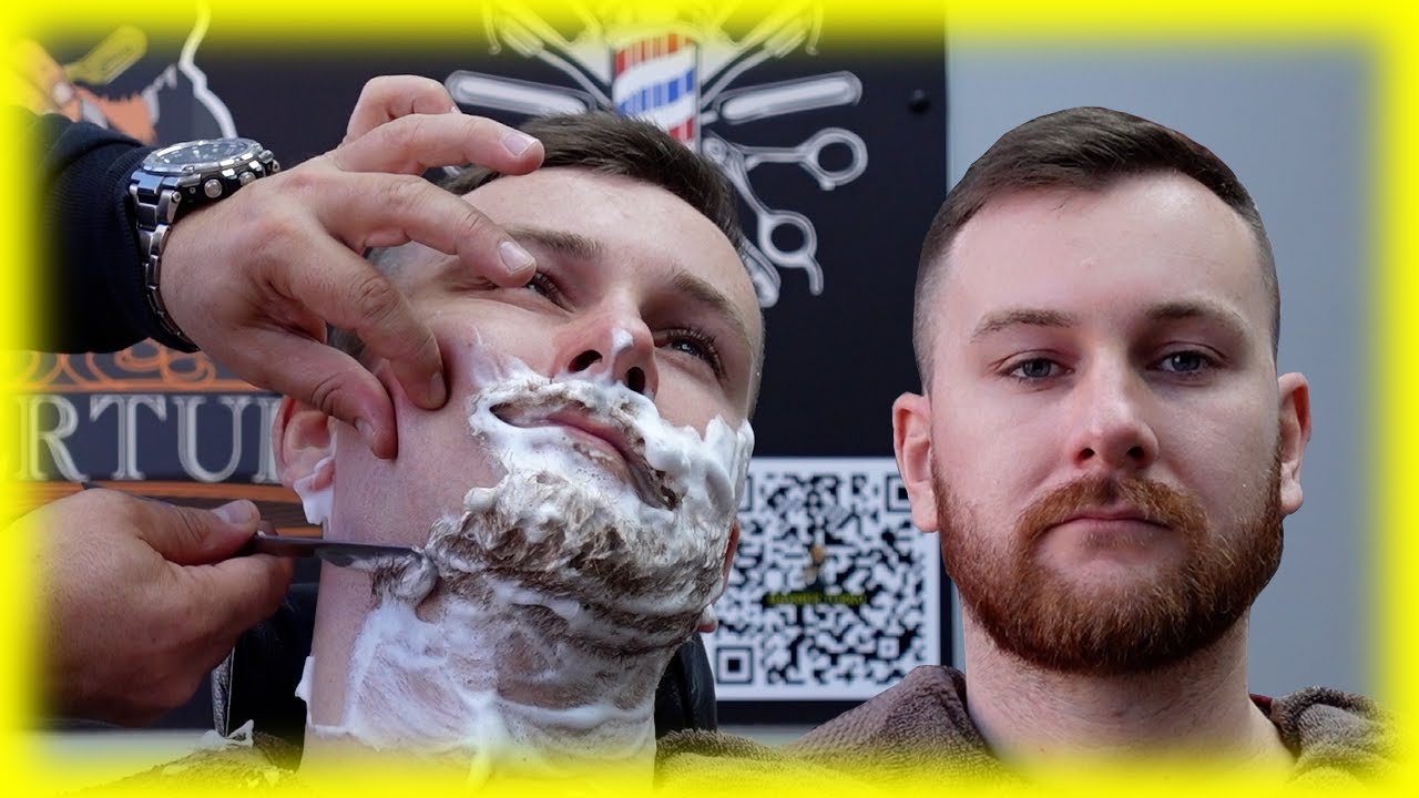 Razor wet shave long Ginger beard at barber shop