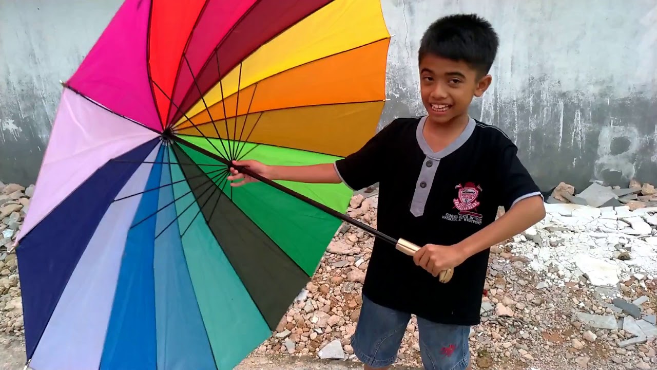 cara memakai payung