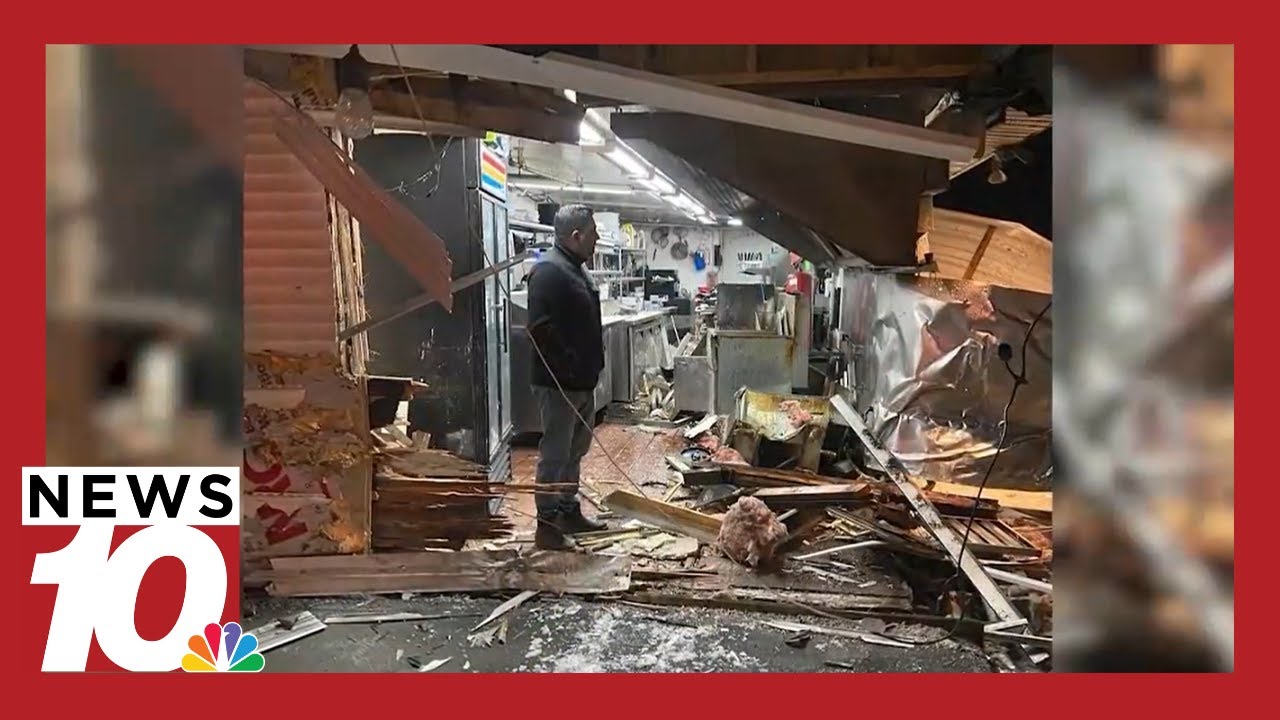 Owners deal with the severe aftermath of a car crashing into their restaurant