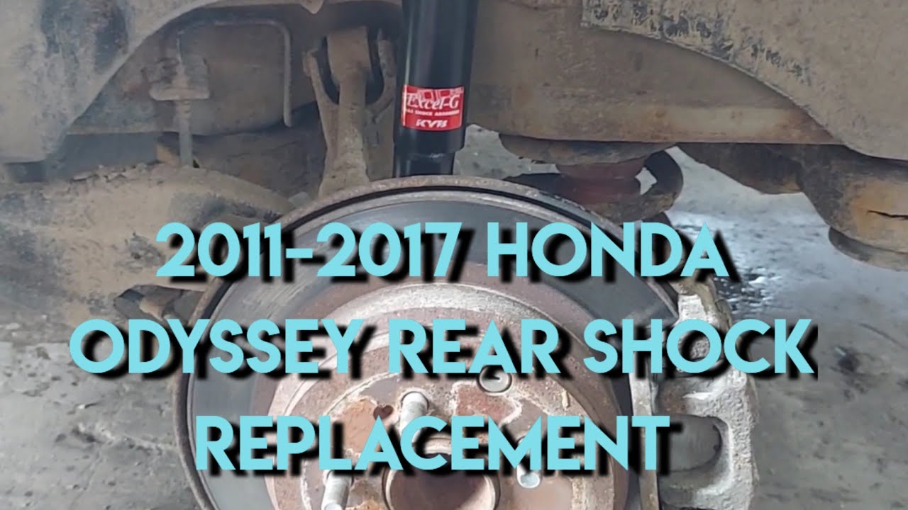 Замена заднего амортизатора Honda Odyssey 2011 года.