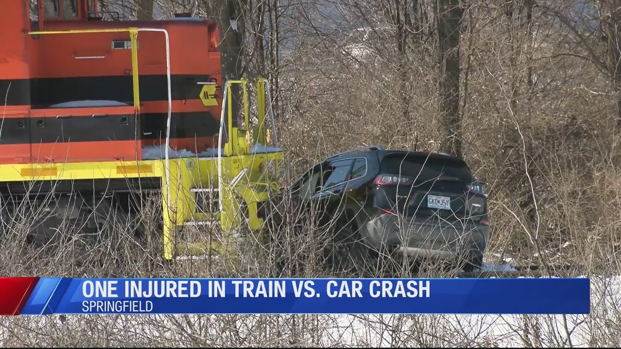 Woman hospitalized after train hits Jeep at Springfield crossing