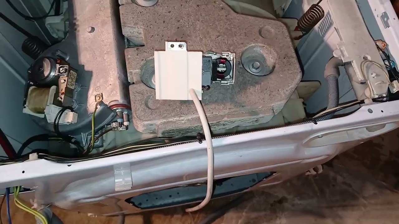 Indesit IWDC6105 washer dryer mains filter repair cigarette smell