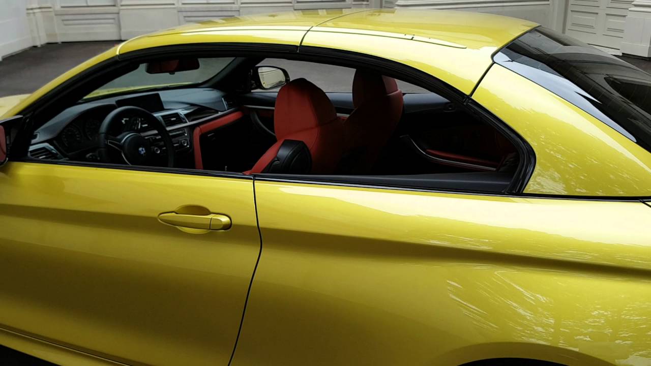 2016 BMW M4 convertible yellow with red interior