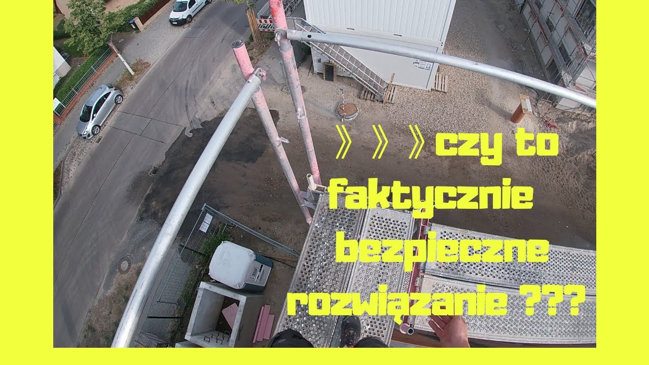 Montaż poręczy wyprzedzających. Rusztowanie firmy Layer. ,,OD zera DO MONTERA''.