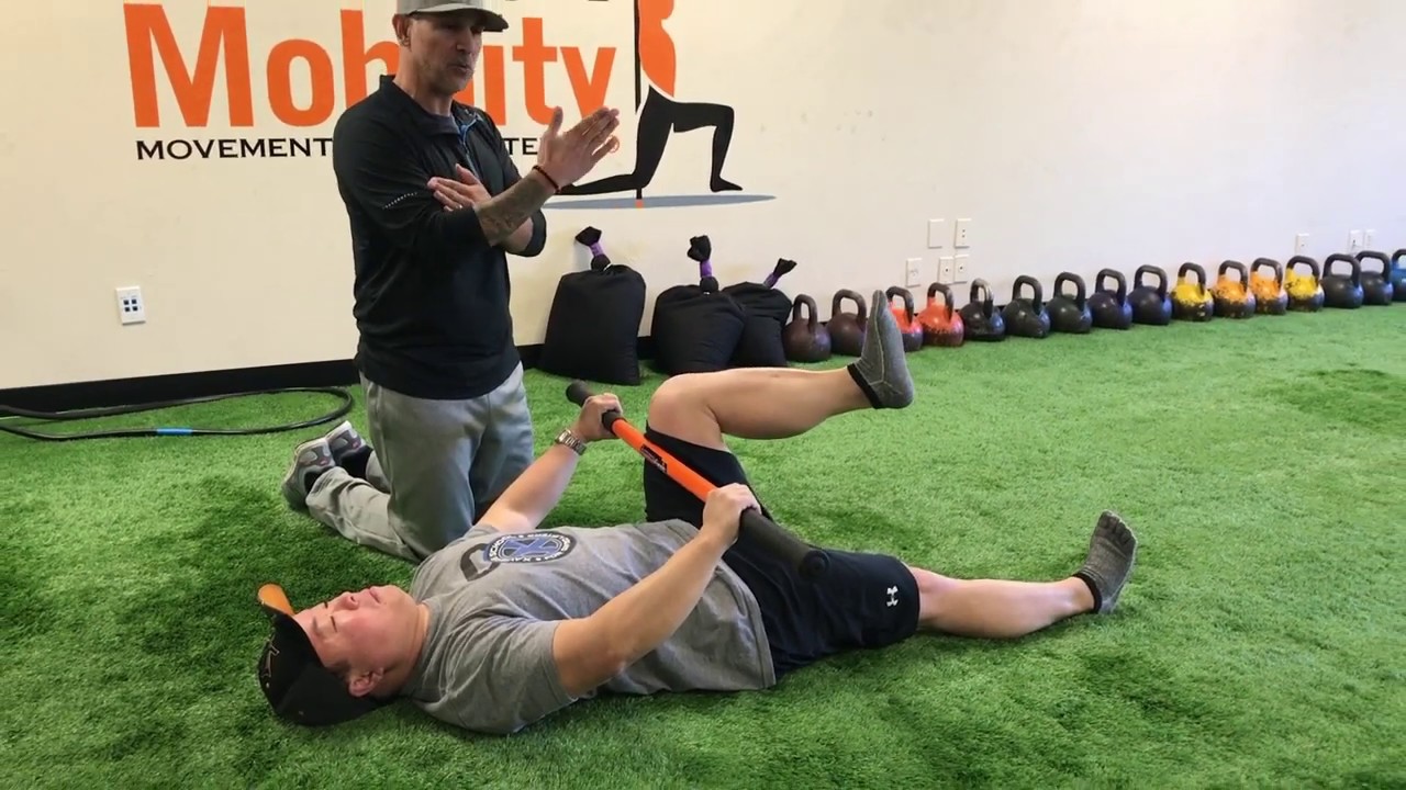 Hip Flexion and Rotation Hip Mobility Drill - Stick Mobility Exercises