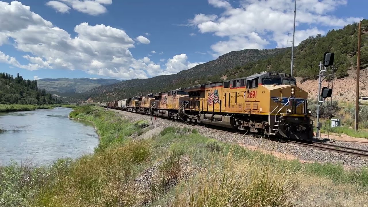 UP MGJNY, BNSF HPVODEN plus Amtrak along the Colorado River, Bond and Glenwood Springs, CO Aug 2023