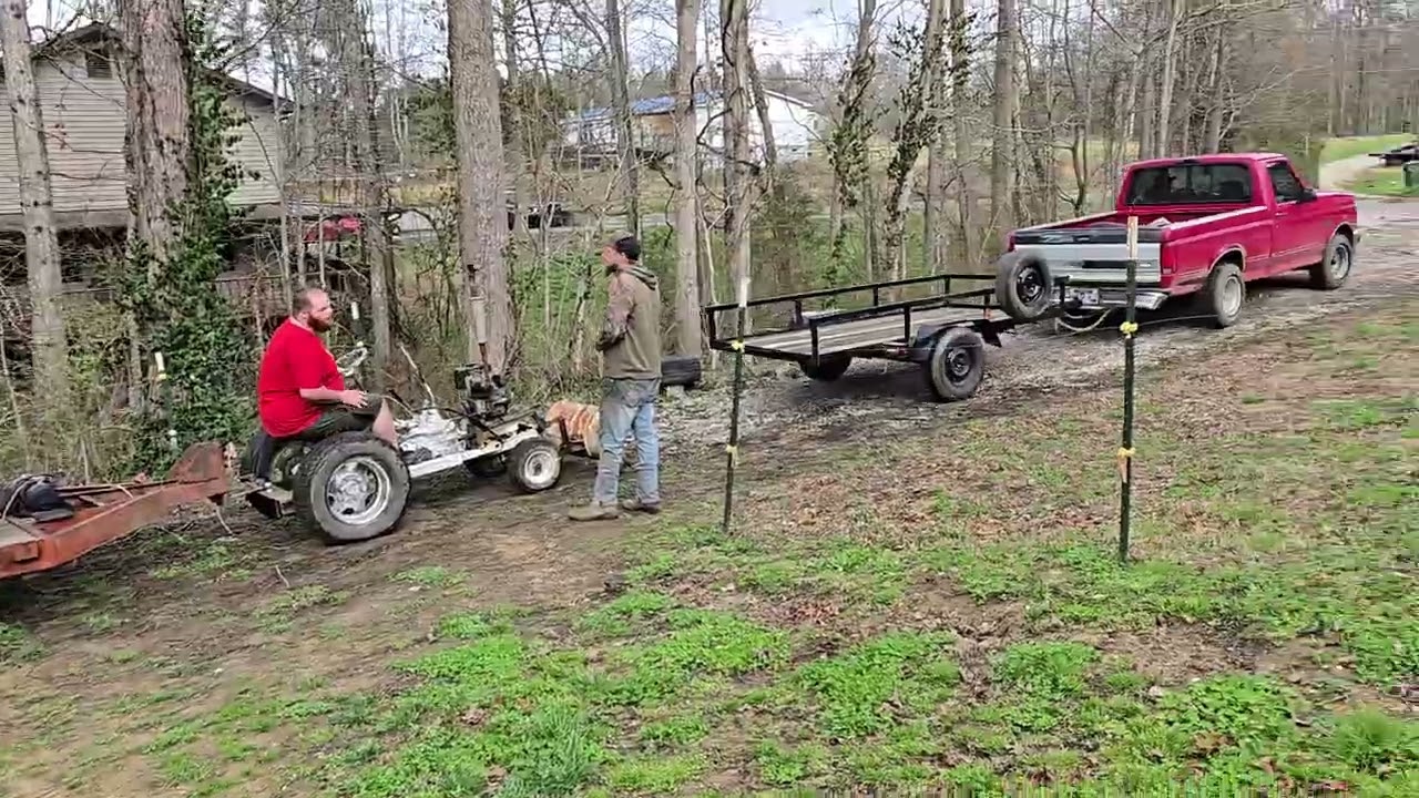 Home Made Tractor Pulls A Car Trailer!