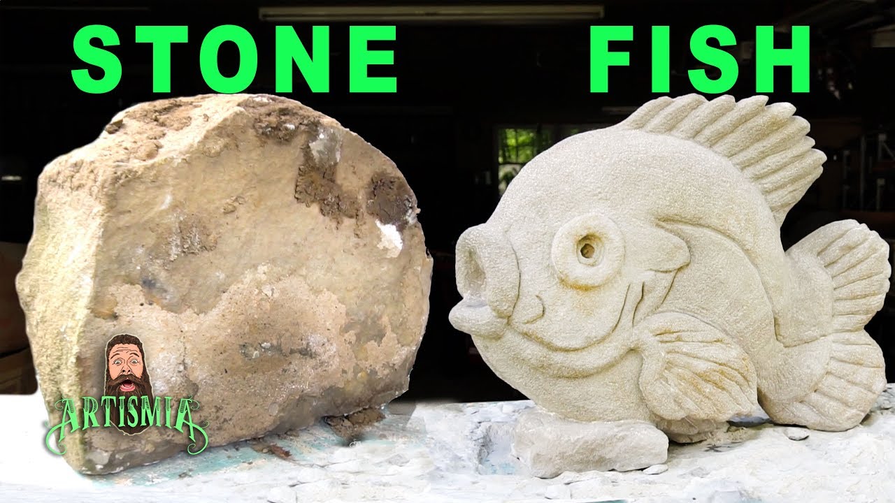 CARVING A STONE FISH  Sculpture