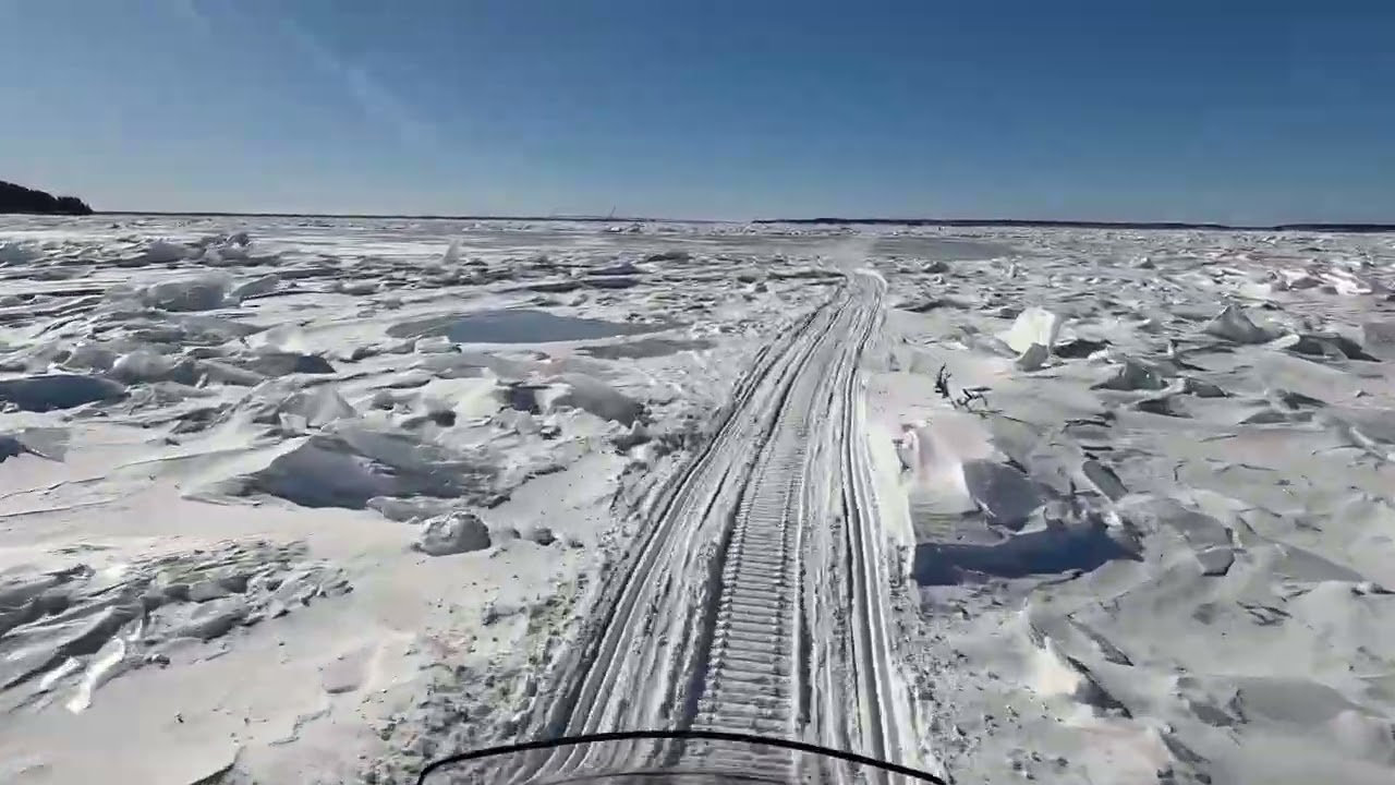 ￼ Taiga electric Snowmobile crossing from Mackinac Island to Saint Ignace￼
