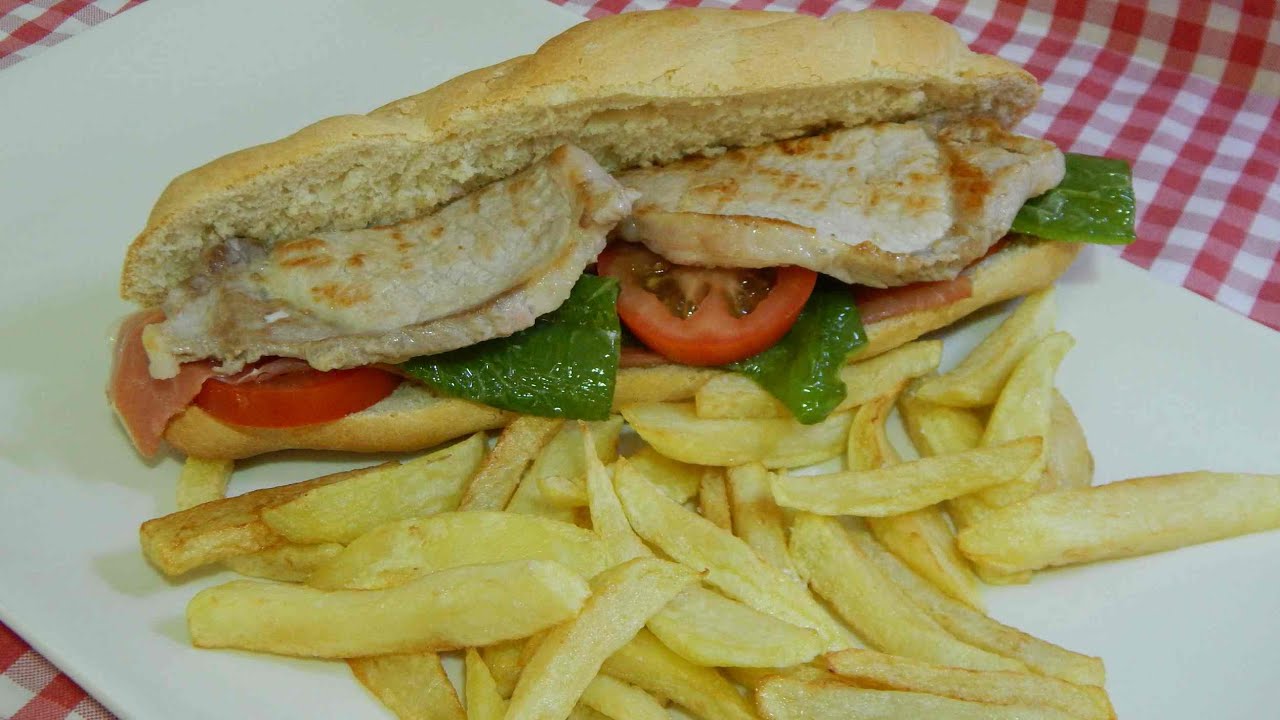 Cómo hacer serranitos un bocadillo de lomo, jamón y pimiento muy tradicional