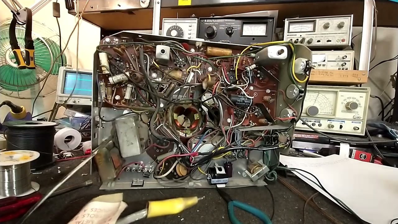 Servicing a 1957 General Electric model 14s208 b&w, vacuum tube television. P4/? -start of the recap