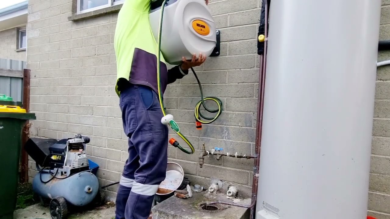 Install a Holman retractable garden hose