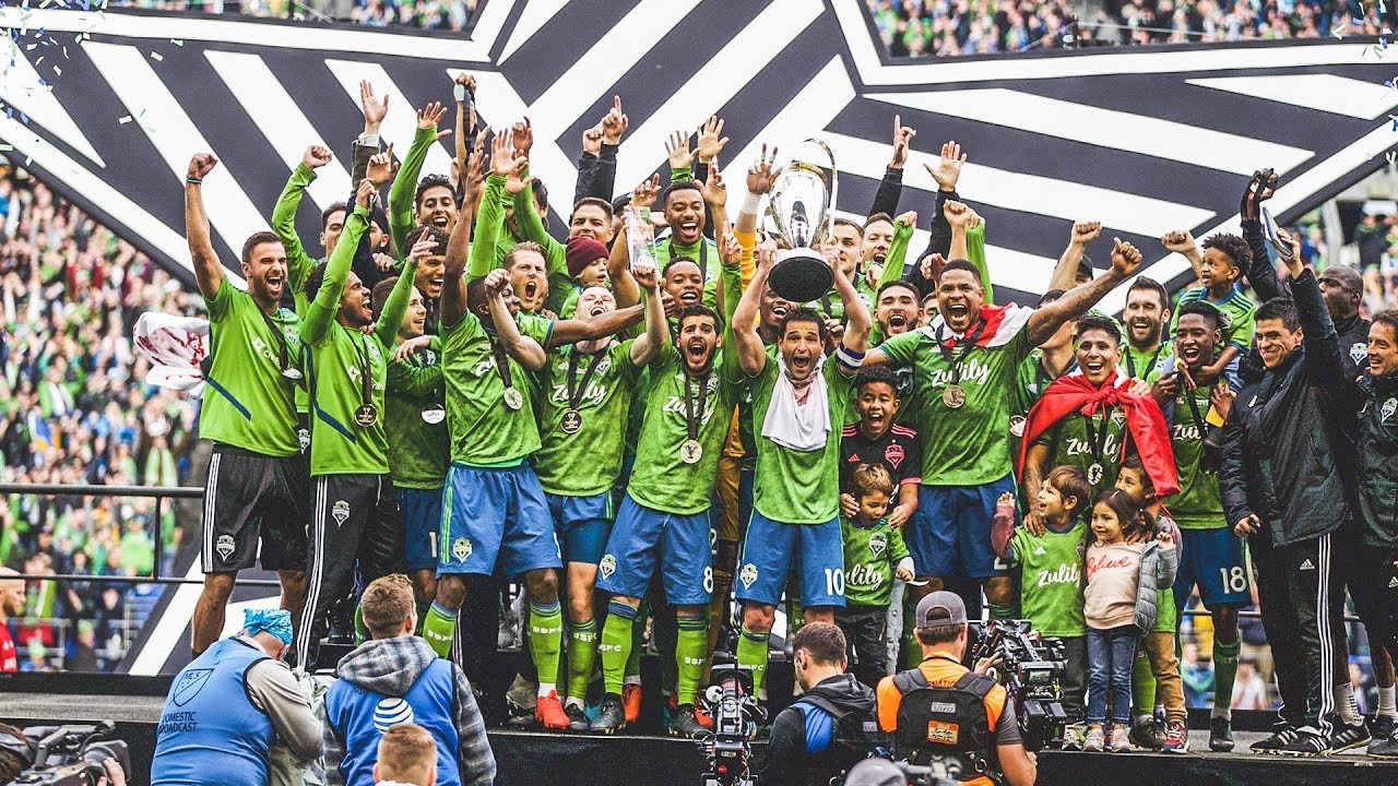 Seattle Sounders FC lift the Philip F. Anschutz trophy after winning 2019 MLS Cup!
