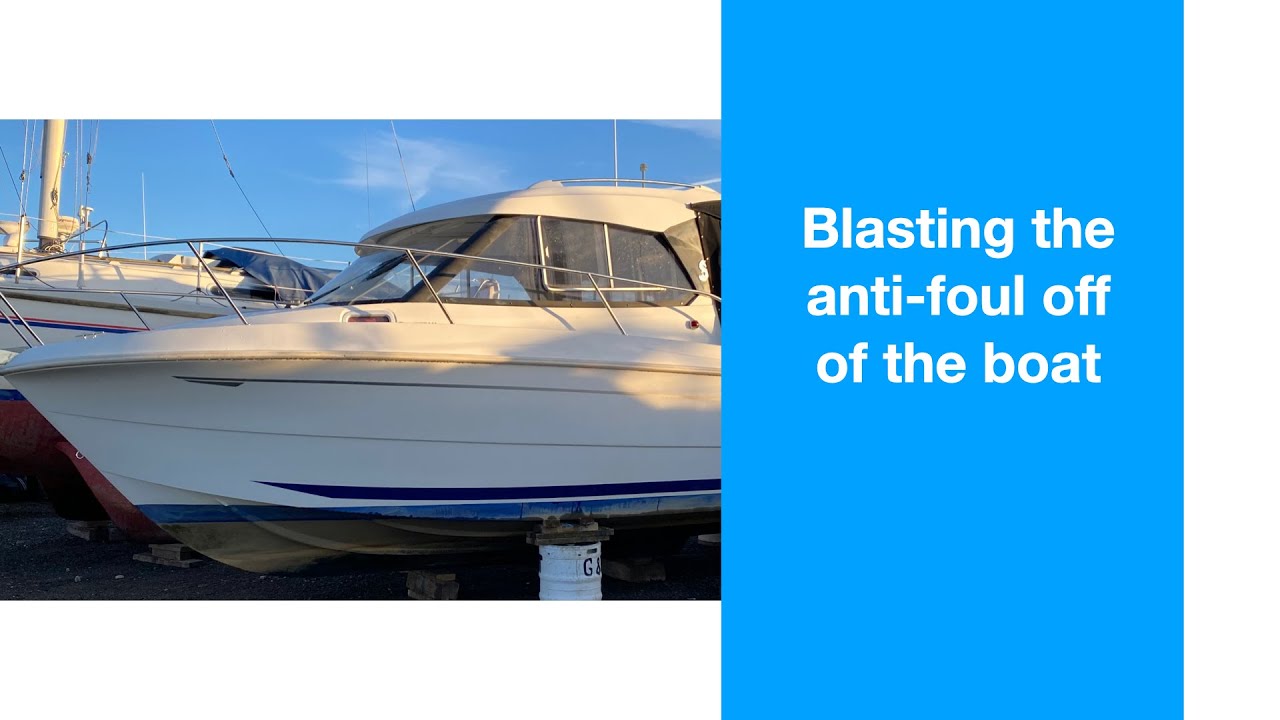 Sand blasting the boat hull
