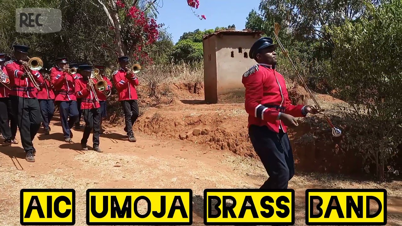 John kaparo with AIC UMOJA BRASS BAND