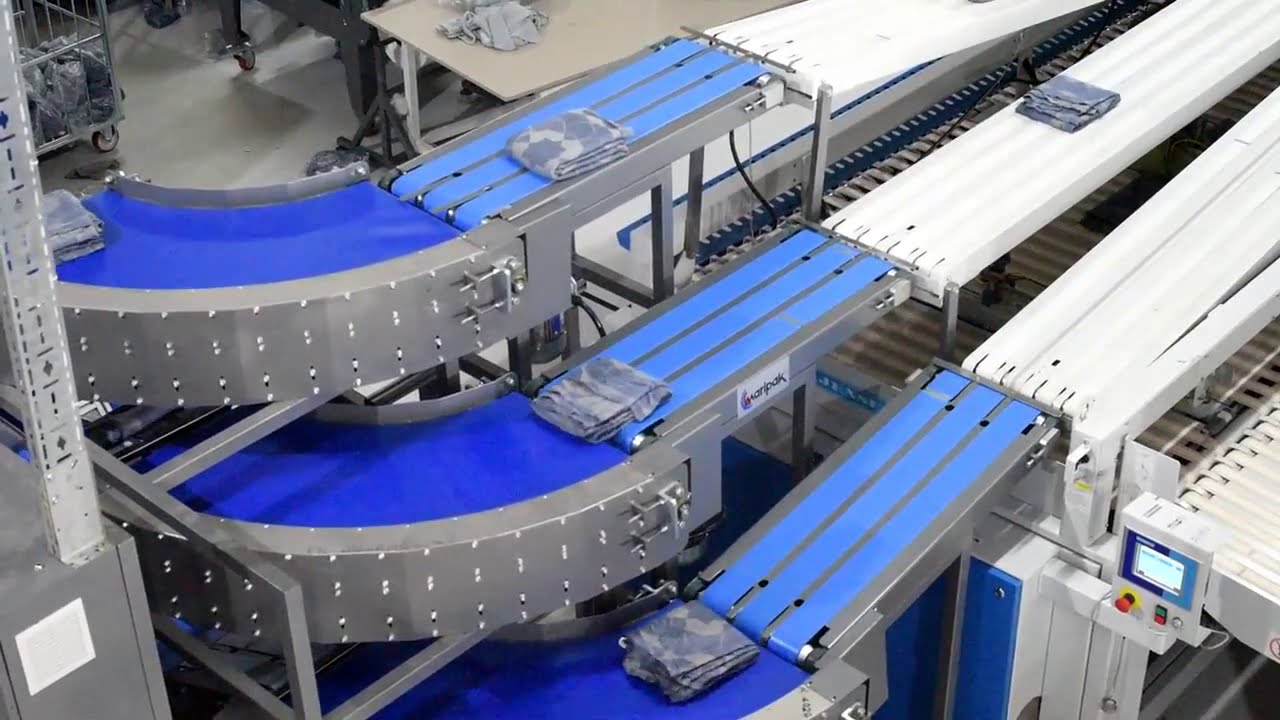 Maripak USA - Impack 40 - Commercial Laundry Packaging and Full Automation with Conveyors