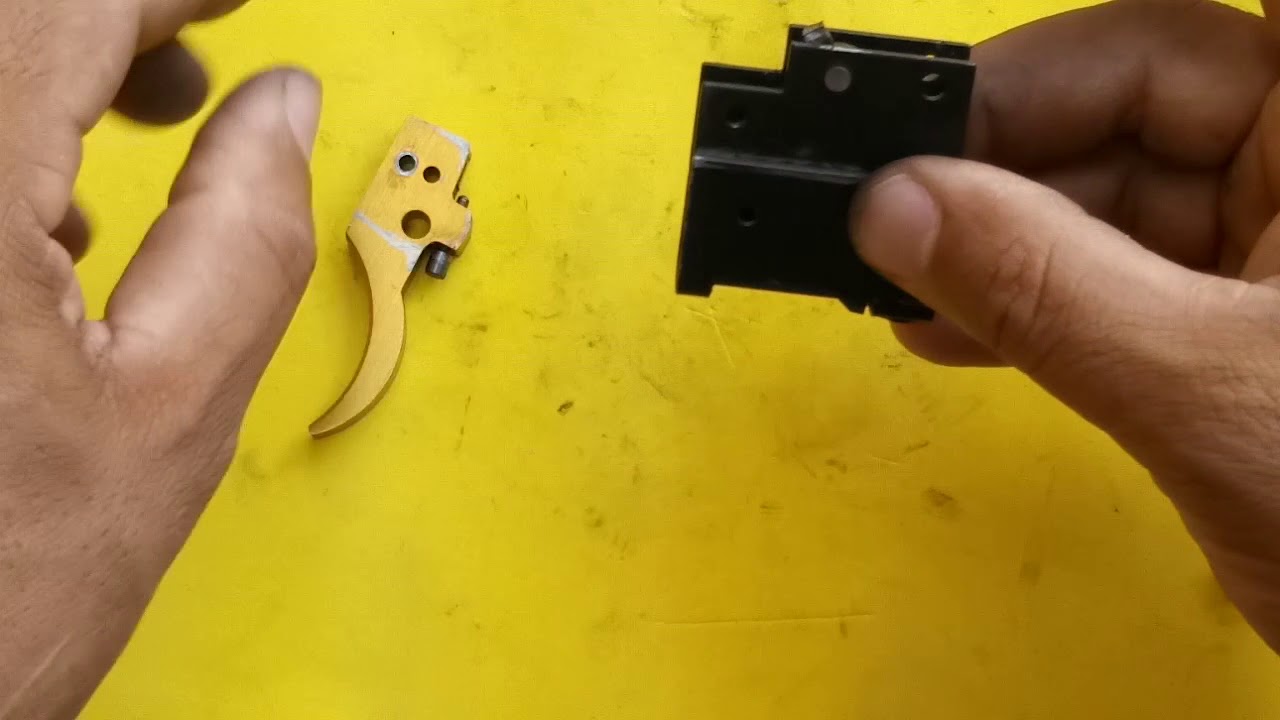 Como montar o gatilho da cometa fenix 400
