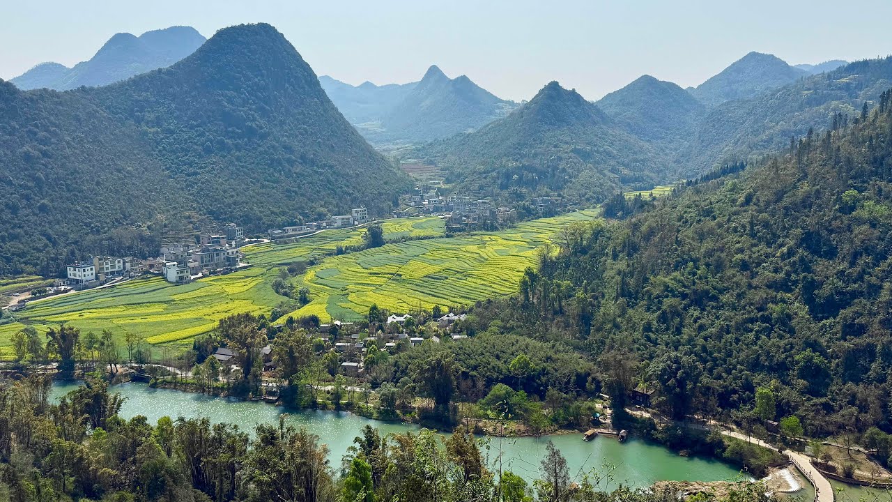 雲南羅平中國最大瀑布群九龍瀑布咯斯特地形油菜花海美景 