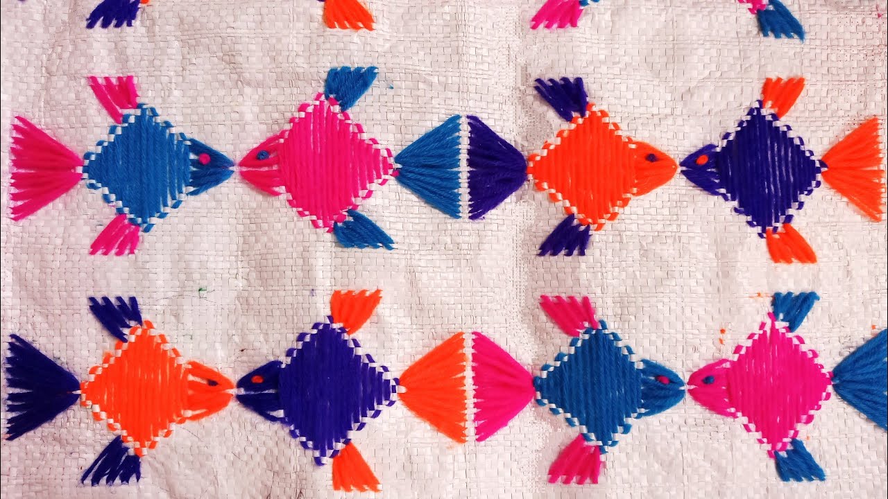 Fish design ashon on empty cement sack/bag.Fish sitting mat/doormat/ason design.Embroidery with wool