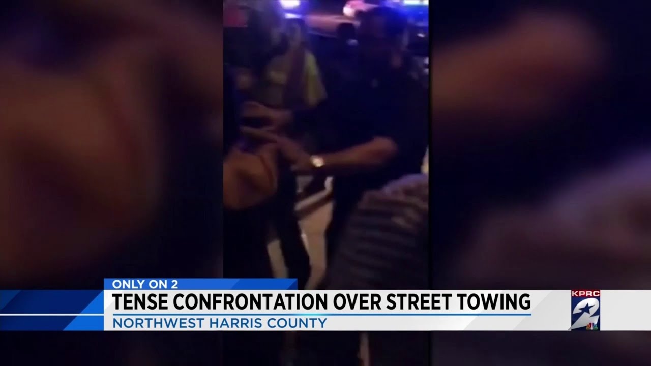 Tense confrontation over street towing