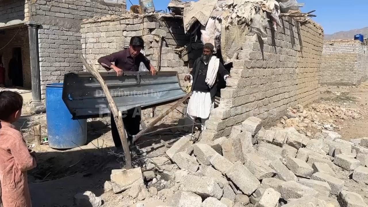 Homes damaged by falling debris after Pakistan says it intercepted drones launched by Taliban