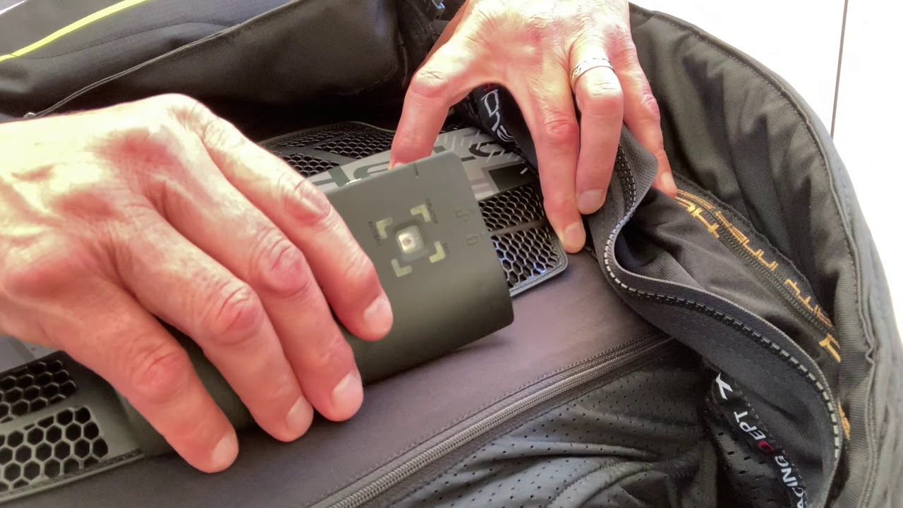Removing and charging The In&Motion e-vest airbag brain!