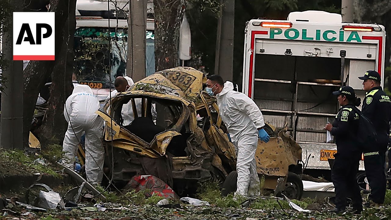 Car bomb and attack on helicopter in Colombia kill at least 17, including officers