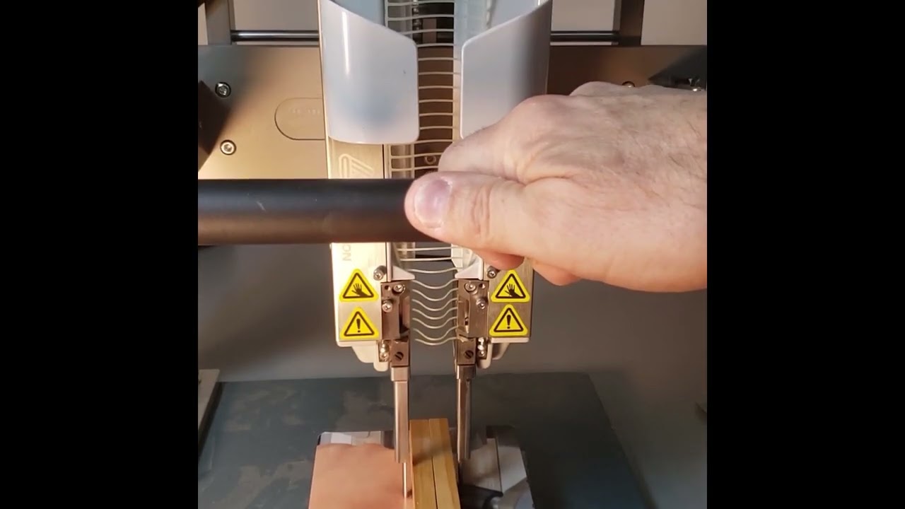 Avery Dennison IndES® (how to apply plastic staples to a product with the IndES® machine)