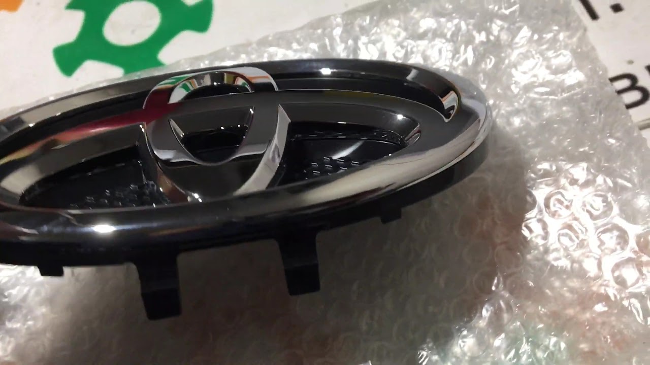 7530152080 75301-52080 Оригинал эмблема знак решетки передняя Toyota Yaris USA