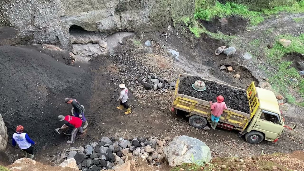 The procesess of mining black sand with lost of coral