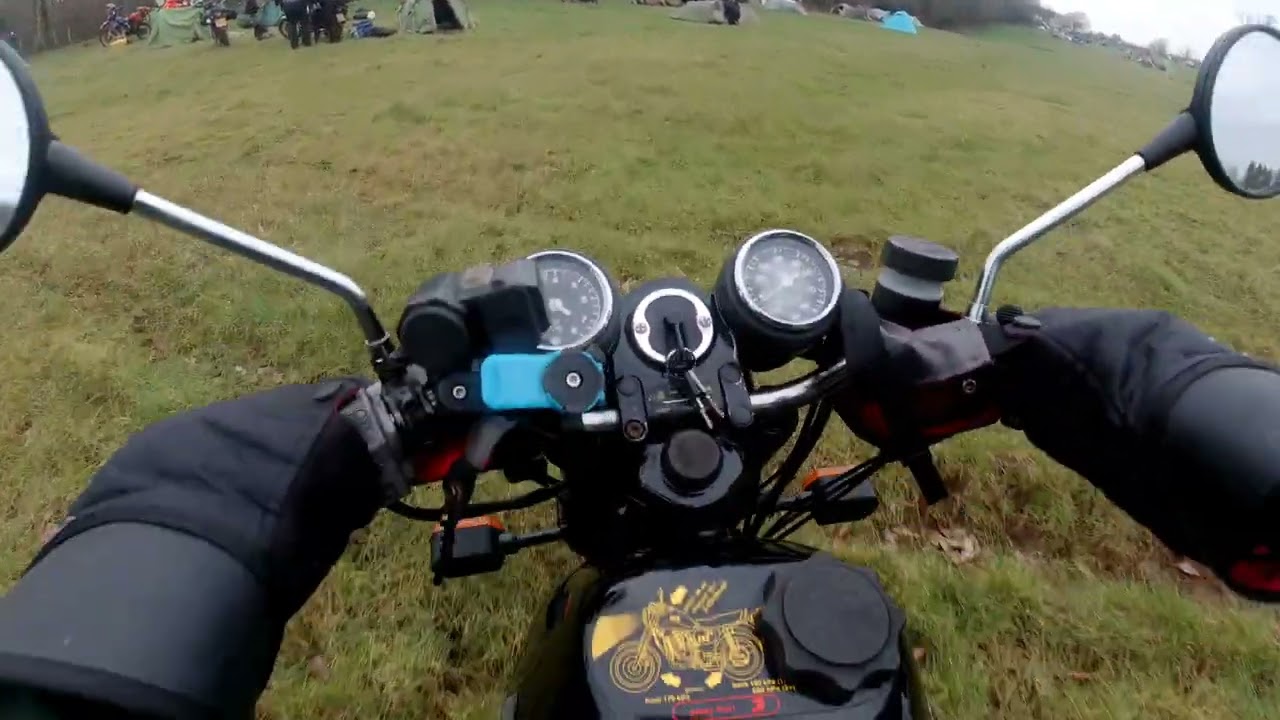 Dragon Rally 2025 riding through the field on MZ ETZ 251