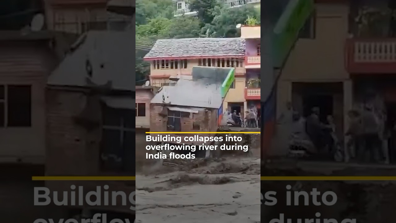 Building collapses into overflowing river during India floods | AJ#shorts