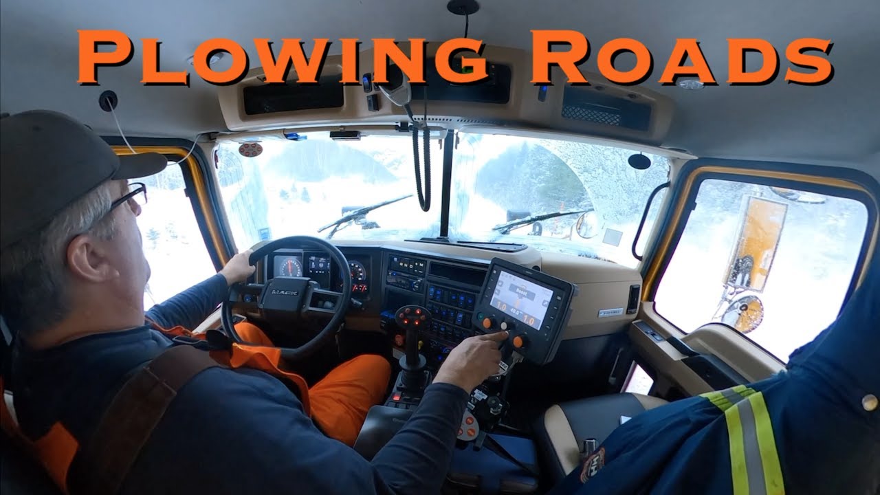 Plowing Roads in a New Mack Truck