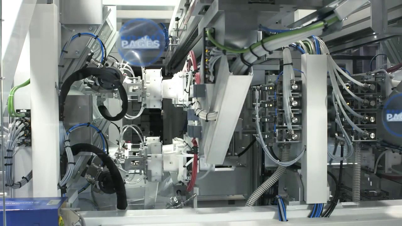 Netstal Injection compression molding on stack molds with IML