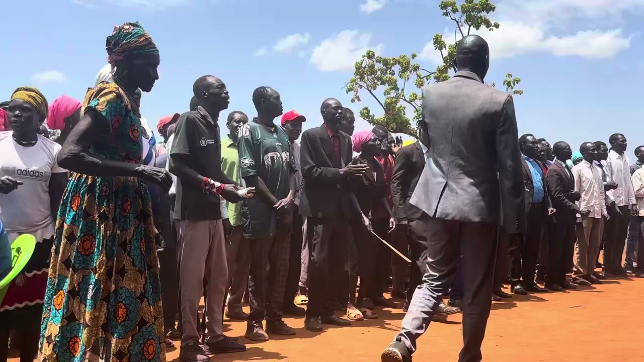 TSore and Sherkole Elders dedicating a song to Isaac Tongo