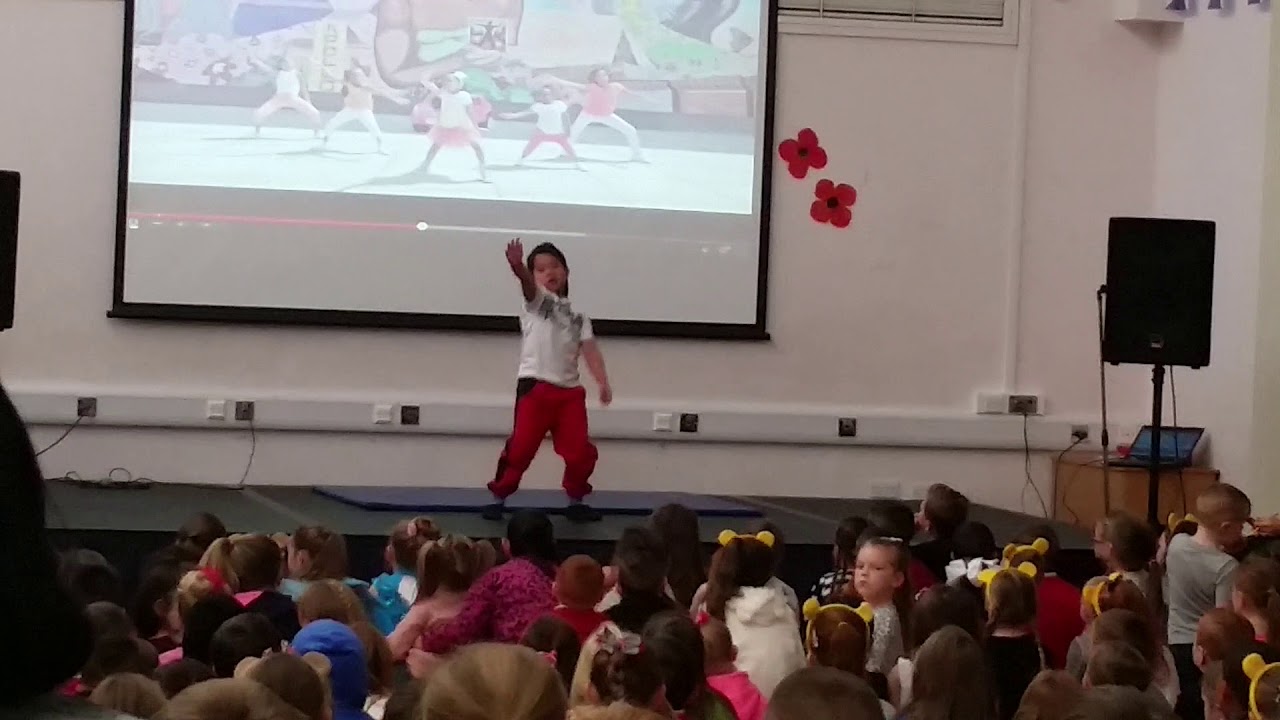 Scott dancing in his primary school 2014