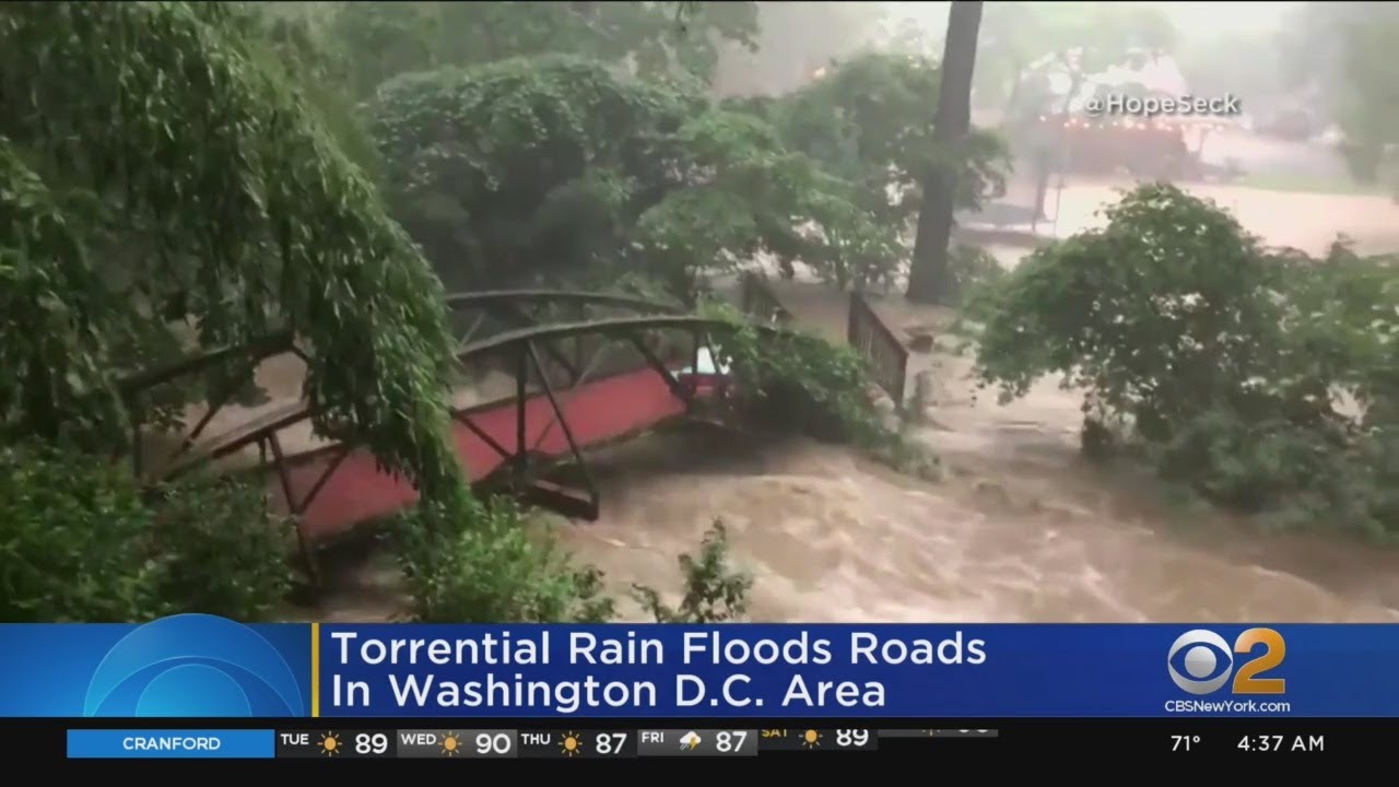 Torrential Rain Floods Roads In Washington D.C. Area