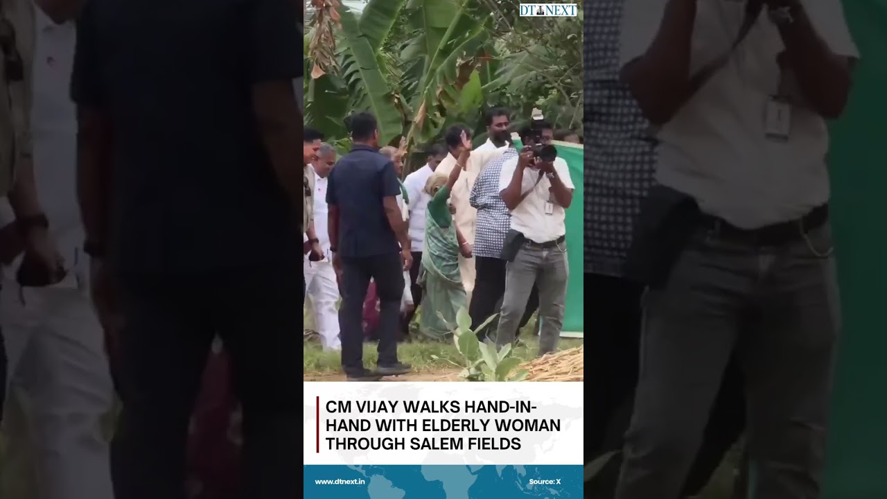 CM Vijay walks hand-in-hand with elderly woman through Salem fields